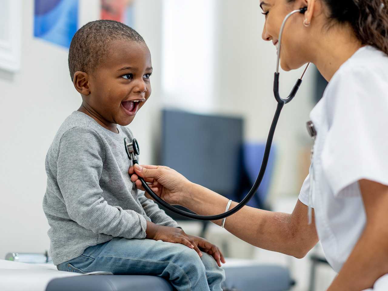 Child receiving care from a physician 